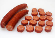 Load image into Gallery viewer, This is the hottest of our trio of Smoked Sausages. Our Cajun Andouille Sausage is ready to heat and eat. Gets hotter the longer you heat it. It's a great sausage to eat on its own or add to red beans & rice.
