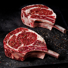 Load image into Gallery viewer, Cut from our well-marbled and properly aged Certified Angus Beef ® Bone-In Ribeye Roasts. Beautifully frenched and expertly trimmed, and weighing 1 1/4 lbs. each, these steaks will satisfy even the heartiest of appetites!