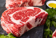 Load image into Gallery viewer, Cut from our beautifully marbled and properly aged Certified Angus Beef ® Boneless Prime Rib roasts, these steaks are perfect for grilling or broiling.