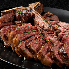 Load image into Gallery viewer, This delicious Certified Angus Beef ® steak features both the New York Strip AND the Tenderloin Filet - what more could you ask for? A traditional favorite, our T-Bone is the best of both worlds! And at 1 1/4 lbs. each, it will satisfy even the heartiest of appetites!
