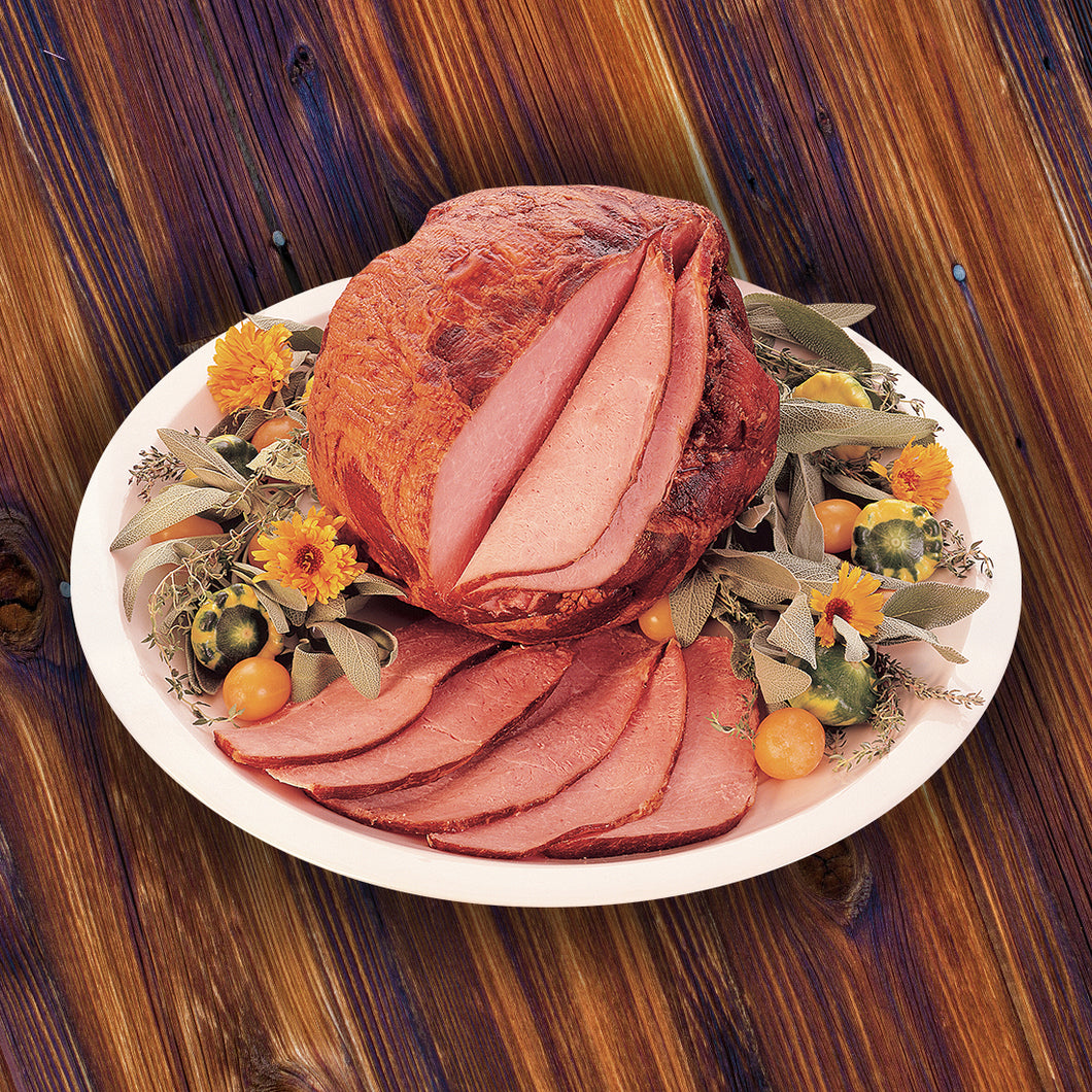 This delicious ham features the same great taste as our Old-Fashioned Bone-In Ham but is boneless for ease and convenience when serving. Slow cooking over hickory chips gives this ham the old-fashioned taste everyone loves. Fully cooked. Ready to heat and serve. 
