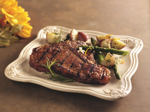 This delicious Certified Angus Beef ® steak features both the New York Strip AND the Tenderloin Filet - what more could you ask for? A traditional favorite, our T-Bone is the best of both worlds! And at 1 1/4 lbs. each, it will satisfy even the heartiest of appetites!